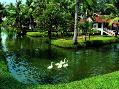Luxury waterfront resort for sale at the famous backwaters of Kumarakom in Kerala