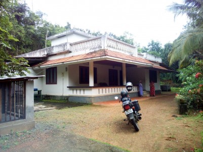 34 cent Square land  with an old house for sale near Puthupally.Kottayam