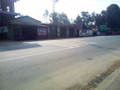 MC Road Frontage - 13 Cent Commercial Land for sale at Kumaranelloor, Kottayam.