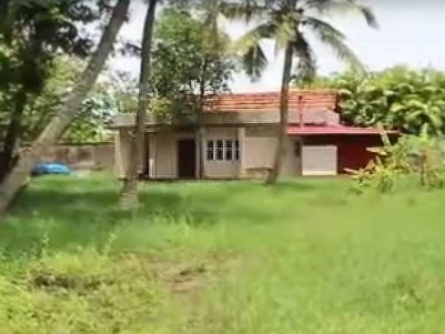 42.5 cents Waterfront Land with 1000 Sq.Ft 2 BHK House for Sale at Maradu, Ernakulam.